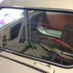 Windscreen mounted.
