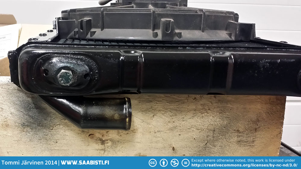 A radiator outlet was removed from a normal V4 radiator and soldered here to point the hose down.