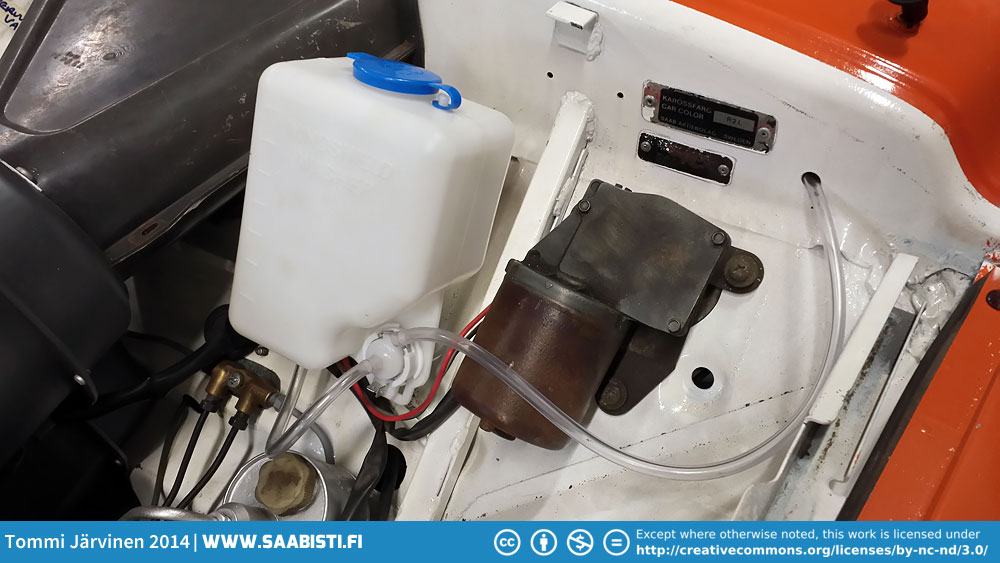 Washer tank and pump.