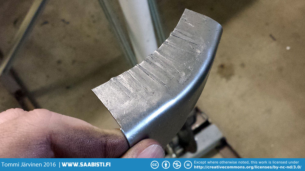 Shrinker teeth marks on a piece of metal.